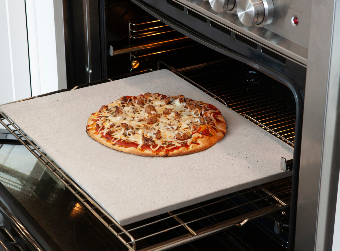 pizza on a home oven baking stone